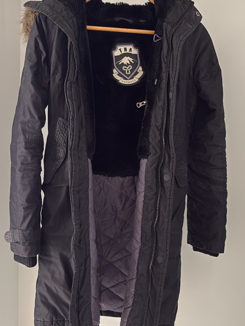 Black womens Long Winter Parka Jacket with Faux Fur Trim Aritzia tna